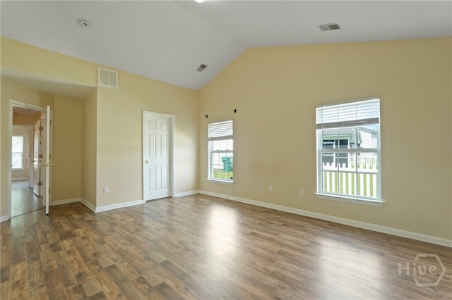 31 Cottingham Way, Pooler, GA 31322 - spare room with plenty of natural light, wood finished floors, and high vaulted ceiling