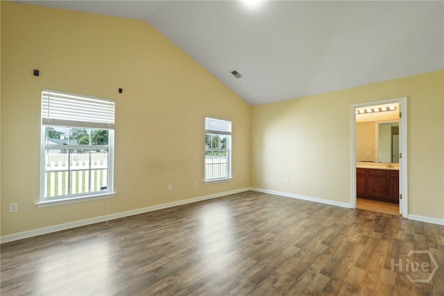 31 Cottingham Way, Pooler, GA 31322 - unfurnished room featuring plenty of natural light, dark wood-type flooring, and high vaulted ceiling