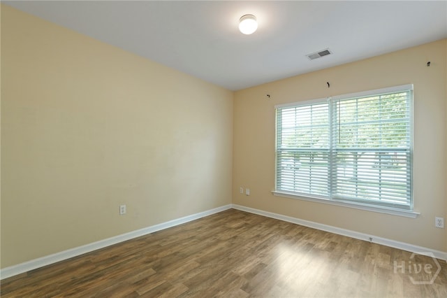31 Cottingham Way, Pooler, GA 31322 - spare room with healthy amount of natural light and dark wood finished floors