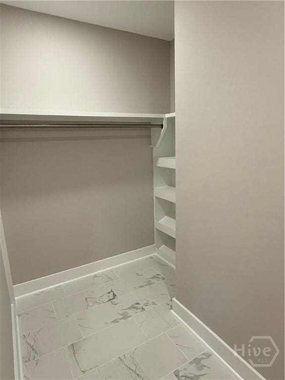 2310 Coakley St, Savannah, GA 31404 - walk in closet with light marble finish flooring