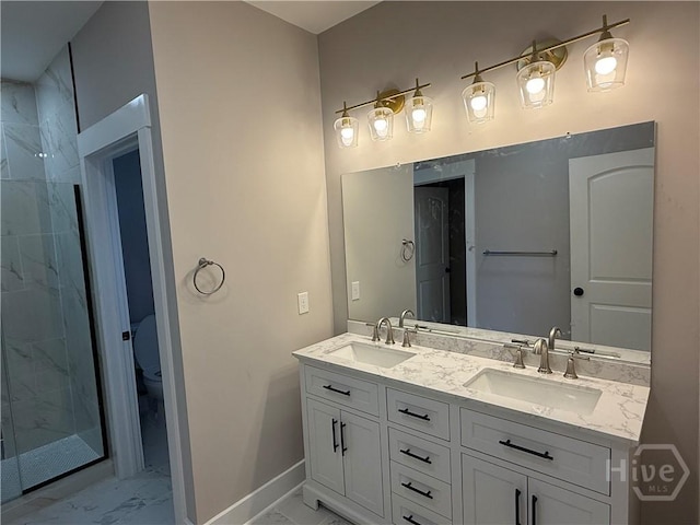 2310 Coakley St, Savannah, GA 31404 - bathroom with marble look tile flooring, double vanity, and a stall shower