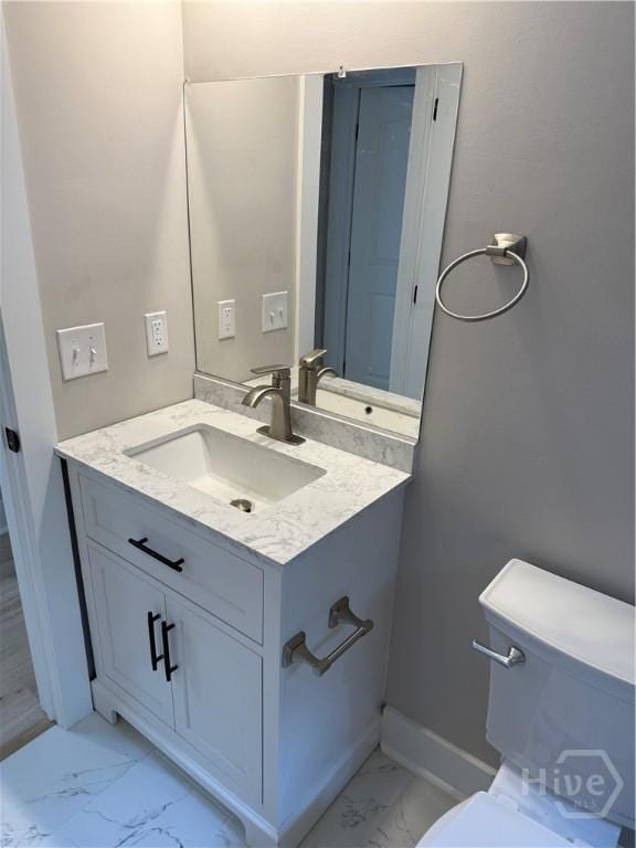 2310 Coakley St, Savannah, GA 31404 - half bath featuring marble look tile flooring and vanity
