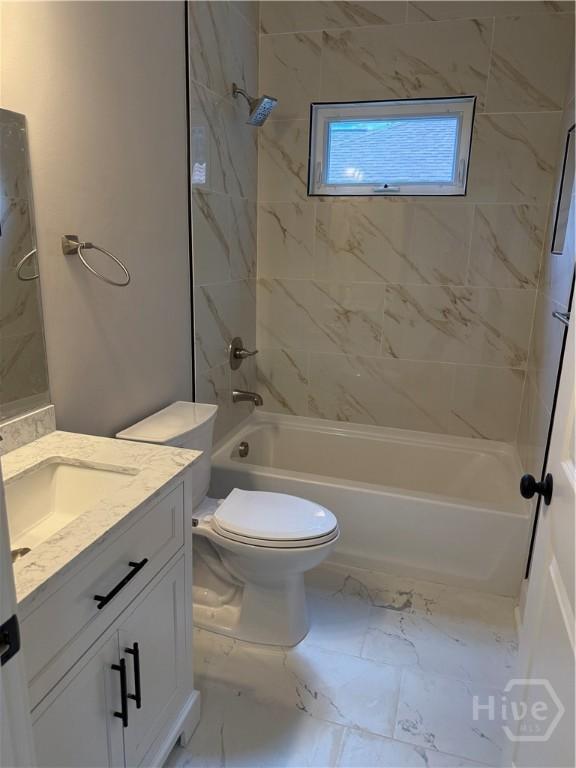 2310 Coakley St, Savannah, GA 31404 - bathroom with vanity, bathtub / shower combination, and marble finish flooring