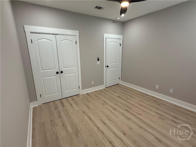 2310 Coakley St, Savannah, GA 31404 - unfurnished bedroom with light wood finished floors, a closet, and a ceiling fan