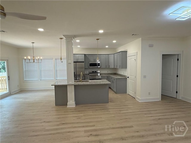 2310 Coakley St, Savannah, GA 31404 - kitchen featuring gray cabinets, appliances with stainless steel finishes, light wood-type flooring, recessed lighting, and a ceiling fan