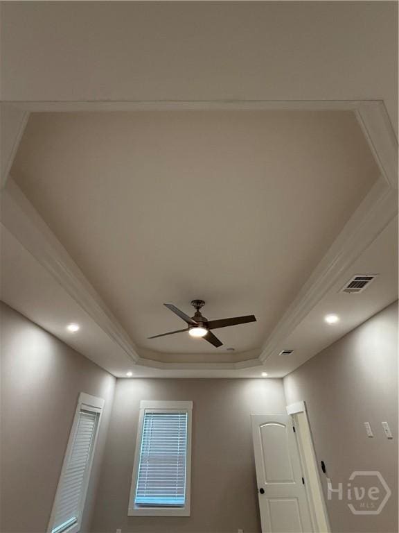 2310 Coakley St, Savannah, GA 31404 - detailed view of ceiling fan, a raised ceiling, and recessed lighting