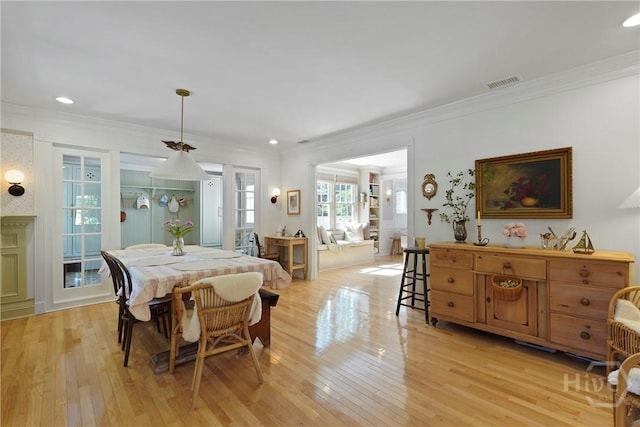 209 E 66th St, Savannah, GA 31405 - dining space featuring crown molding, light wood-style flooring, and recessed lighting