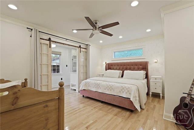 209 E 66th St, Savannah, GA 31405 - bedroom featuring light wood-style floors, crown molding, multiple windows, a barn door, and a ceiling fan