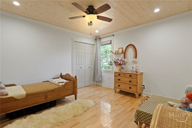 209 E 66th St, Savannah, GA 31405 - bedroom with ornamental molding, recessed lighting, light wood-type flooring, wooden ceiling, and a closet