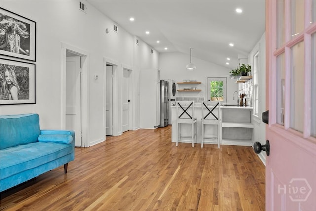 731 E 34th St, Savannah, GA 31401 - foyer featuring vaulted ceiling, light wood finished floors, and recessed lighting