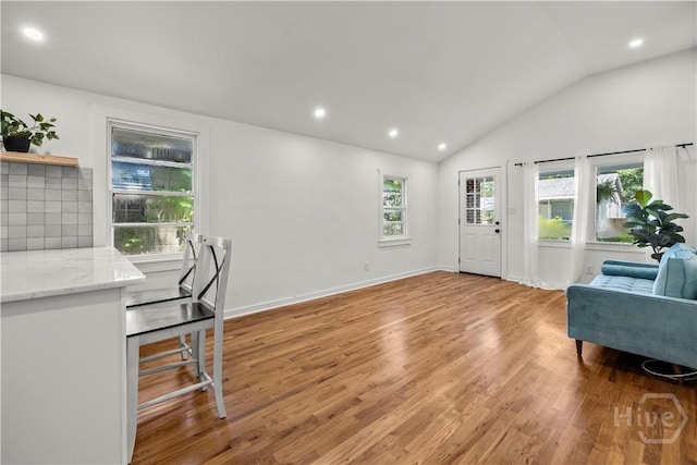 731 E 34th St, Savannah, GA 31401 - living area with vaulted ceiling, light wood-style flooring, and recessed lighting