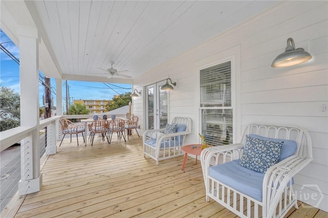 13 Izlar Ave, Tybee Island, GA 31328 - wooden deck with a ceiling fan