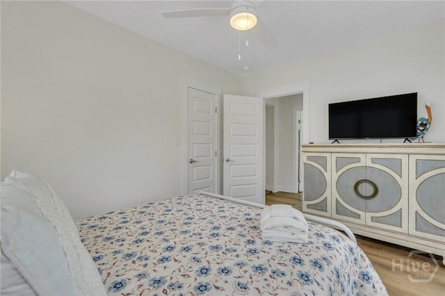 13 Izlar Ave, Tybee Island, GA 31328 - bedroom featuring wood finished floors and a ceiling fan