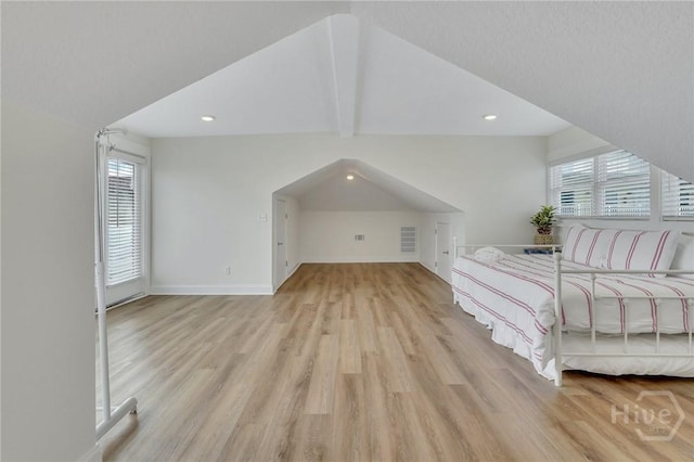 13 Izlar Ave, Tybee Island, GA 31328 - unfurnished bedroom featuring light wood-style flooring, recessed lighting, and lofted ceiling