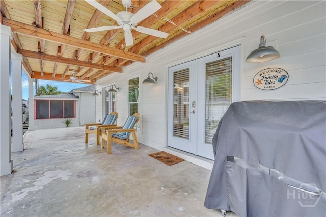 13 Izlar Ave, Tybee Island, GA 31328 - view of patio / terrace featuring ceiling fan, area for grilling, and french doors