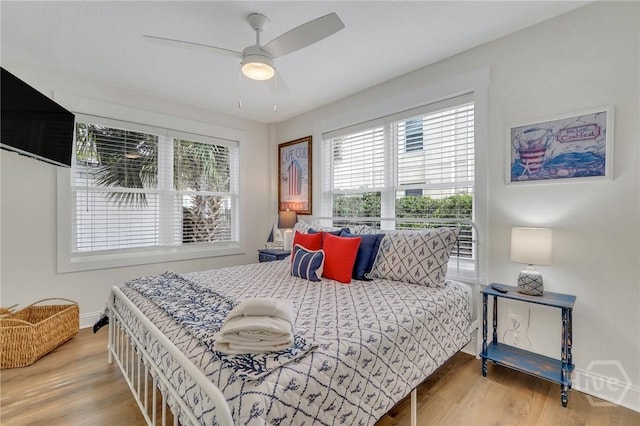 13 Izlar Ave, Tybee Island, GA 31328 - bedroom featuring wood finished floors and ceiling fan