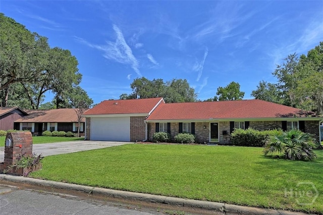 904 Mill Dr, Savannah, GA 31419 - single story home featuring driveway, a garage, a front lawn, and brick siding