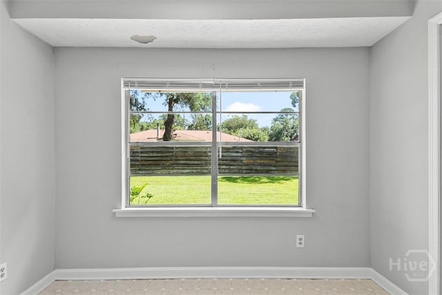 904 Mill Dr, Savannah, GA 31419 - spare room with healthy amount of natural light and light tile patterned flooring