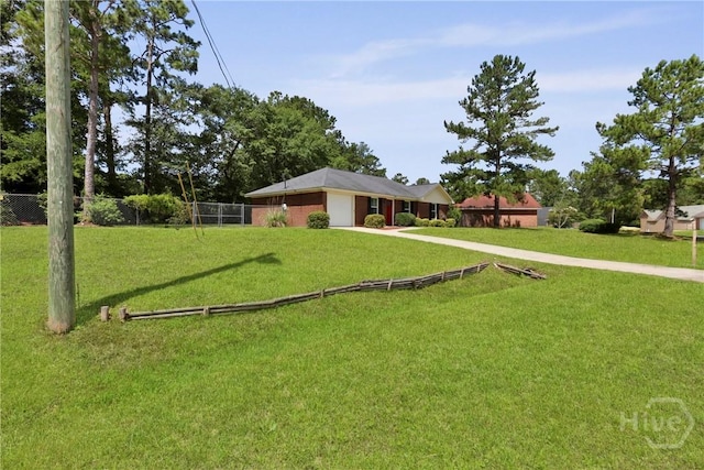 340 Hunters Branch Dr, Allenhurst, GA 31301 - view of front of house with a garage and concrete driveway