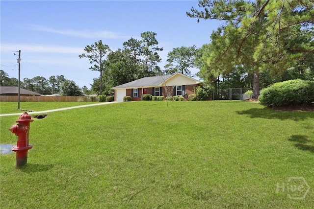 340 Hunters Branch Dr, Allenhurst, GA 31301 - single story home with a garage and driveway