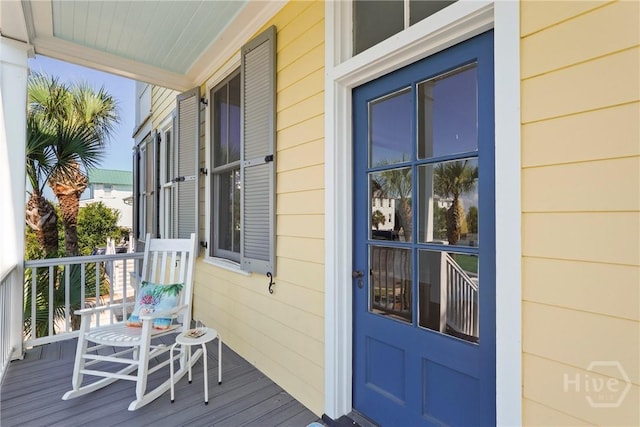 3 Palmwood Ct, Tybee Island, GA 31328 - view of exterior entry with covered porch