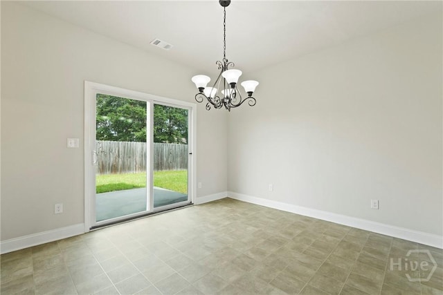 153 Whirlwind Way, Guyton, GA 31312 - empty room featuring a chandelier and baseboards