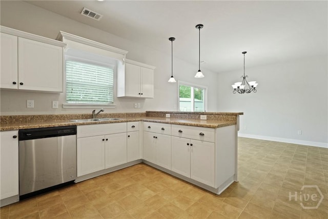 153 Whirlwind Way, Guyton, GA 31312 - kitchen with dishwasher, a peninsula, light floors, white cabinetry, and a chandelier
