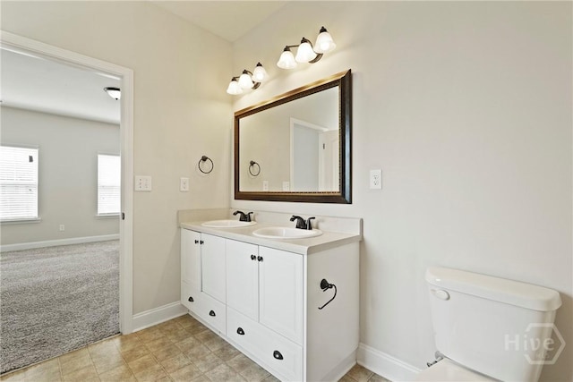 153 Whirlwind Way, Guyton, GA 31312 - full bathroom featuring double vanity and toilet