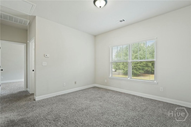 153 Whirlwind Way, Guyton, GA 31312 - carpeted empty room with attic access and baseboards