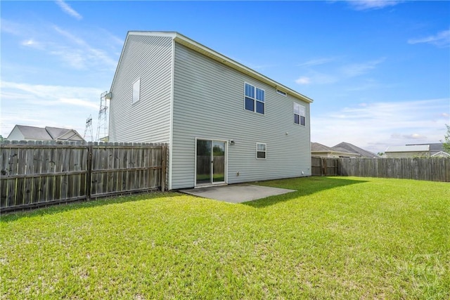 153 Whirlwind Way, Guyton, GA 31312 - rear view of house with a patio area and a fenced backyard