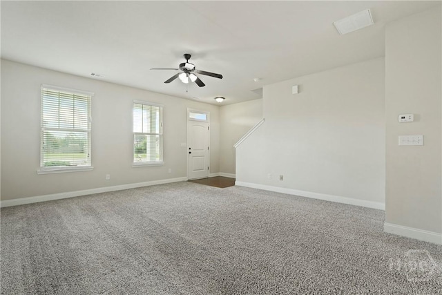 153 Whirlwind Way, Guyton, GA 31312 - unfurnished living room with ceiling fan and carpet floors