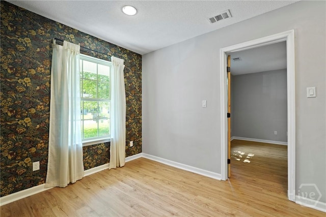 7305 Leghorn St, Savannah, GA 31406 - empty room featuring baseboards and wood finished floors