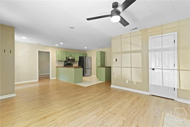 7305 Leghorn St, Savannah, GA 31406 - unfurnished living room featuring light wood-style flooring, ceiling fan, and recessed lighting