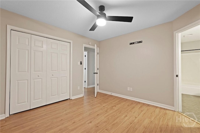 7305 Leghorn St, Savannah, GA 31406 - unfurnished bedroom with light wood-style floors, a closet, and a ceiling fan