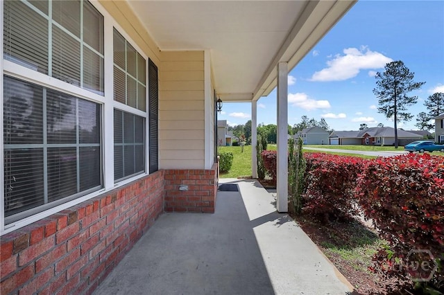 243 Forest St NE, Ludowici, GA 31316 - view of patio featuring a residential view