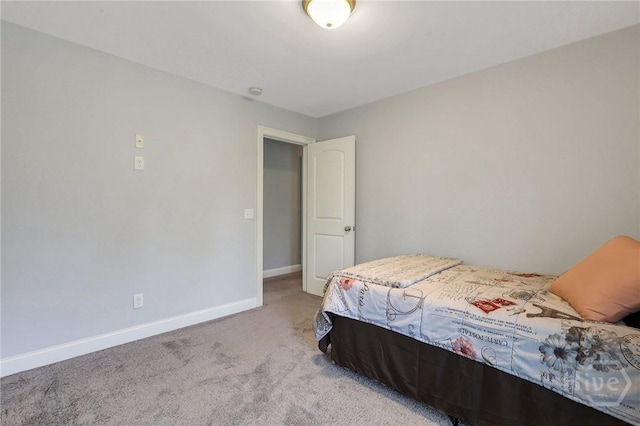 243 Forest St NE, Ludowici, GA 31316 - bedroom featuring light colored carpet and baseboards