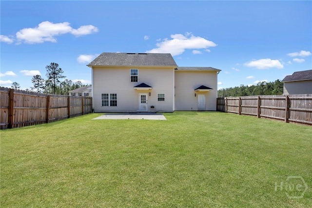 243 Forest St NE, Ludowici, GA 31316 - rear view of house with a patio and a fenced backyard