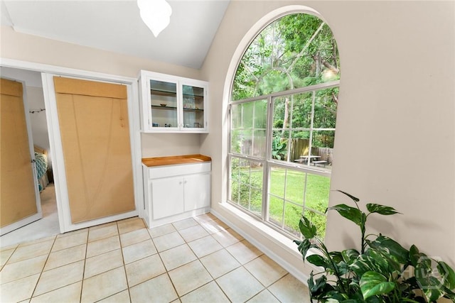 178 Junco Way, Savannah, GA 31419 - doorway to outside with light tile patterned flooring and lofted ceiling