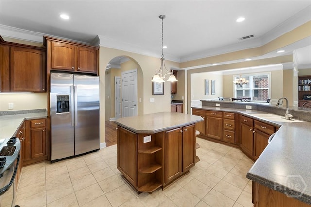 903 River Oaks Dr Unit 903, Richmond Hill, GA 31324 - kitchen featuring stainless steel fridge with ice dispenser, stove, a chandelier, a center island, and ornamental molding