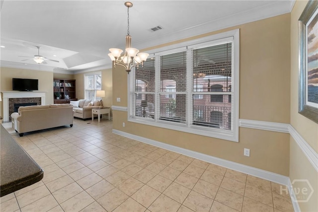 903 River Oaks Dr Unit 903, Richmond Hill, GA 31324 - living area featuring a chandelier, tile patterned floors, ceiling fan, a fireplace, and crown molding