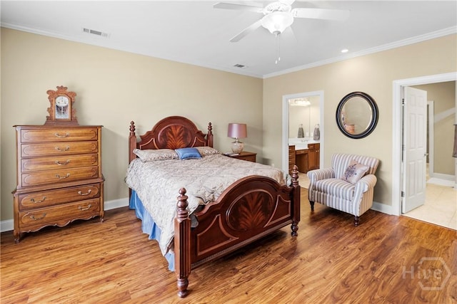 903 River Oaks Dr Unit 903, Richmond Hill, GA 31324 - bedroom with crown molding, wood finished floors, connected bathroom, and a ceiling fan
