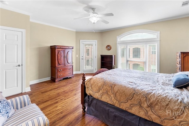 903 River Oaks Dr Unit 903, Richmond Hill, GA 31324 - bedroom with wood finished floors, crown molding, access to outside, and ceiling fan
