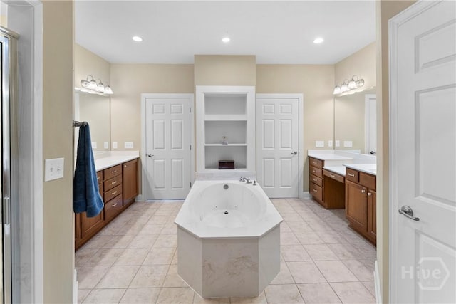 903 River Oaks Dr Unit 903, Richmond Hill, GA 31324 - full bath featuring a jetted tub, vanity, tile patterned flooring, and recessed lighting