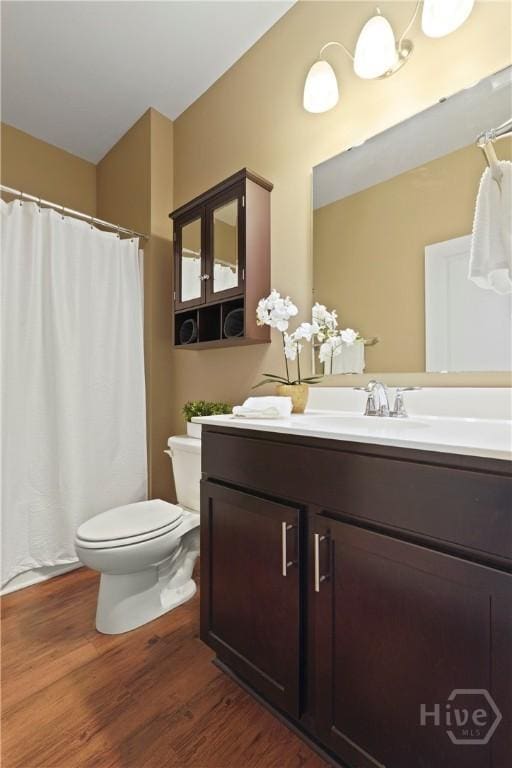 7 Saddle St N, Savannah, GA 31407 - full bathroom with wood finished floors, vanity, and curtained shower