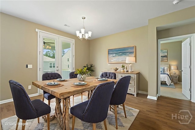 7 Saddle St N, Savannah, GA 31407 - dining space featuring a chandelier, wood finished floors, and french doors