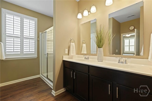 7 Saddle St N, Savannah, GA 31407 - full bathroom featuring double vanity, wood finished floors, and a shower stall