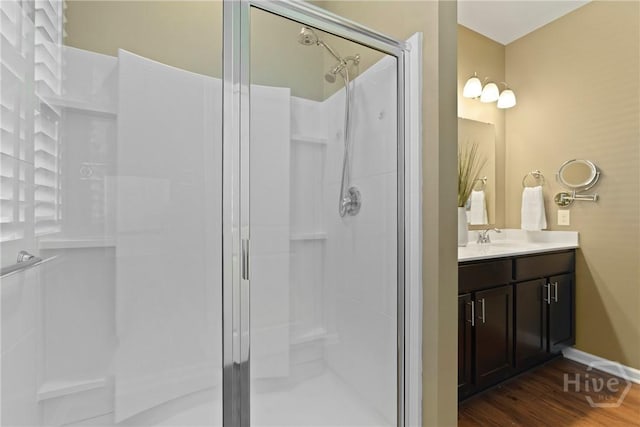 7 Saddle St N, Savannah, GA 31407 - bathroom with a shower stall, vanity, and wood finished floors
