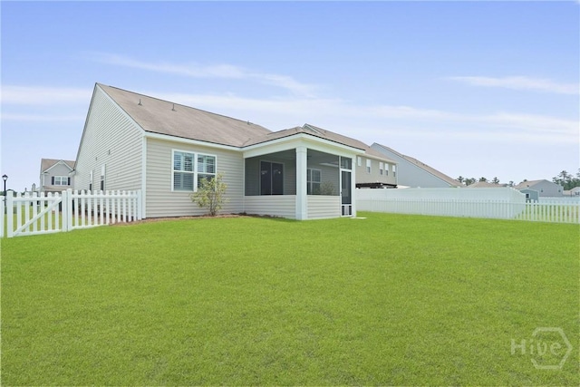 7 Saddle St N, Savannah, GA 31407 - rear view of property with a fenced backyard and a sunroom