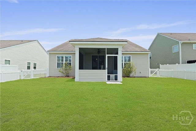 7 Saddle St N, Savannah, GA 31407 - rear view of house featuring a sunroom, a fenced backyard, roof with shingles, and ceiling fan