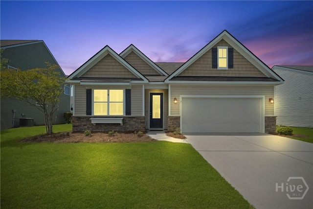 7 Saddle St N, Savannah, GA 31407 - craftsman inspired home with driveway, a front yard, a garage, and stone siding